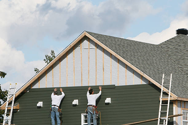 Professional Siding Contractor technician working in Saint Clairsville, OH
